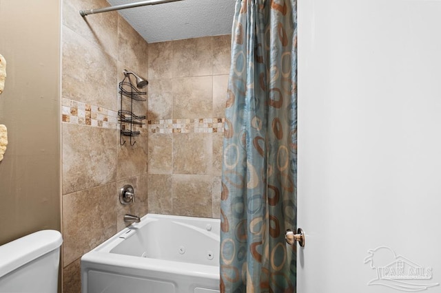 8425 Gulf Blvd Unit 206, Navarre Beach, FL 32566 - bathroom featuring shower / tub combo with curtain and toilet