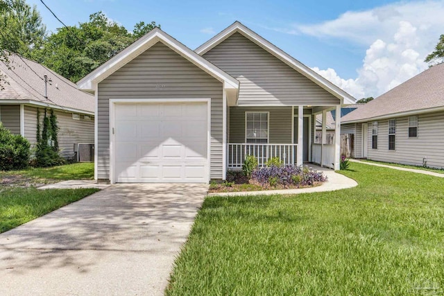 6027 Dallas Ave, Pensacola, FL 32526 - view of front of property featuring covered porch, a garage, driveway, and a front yard
