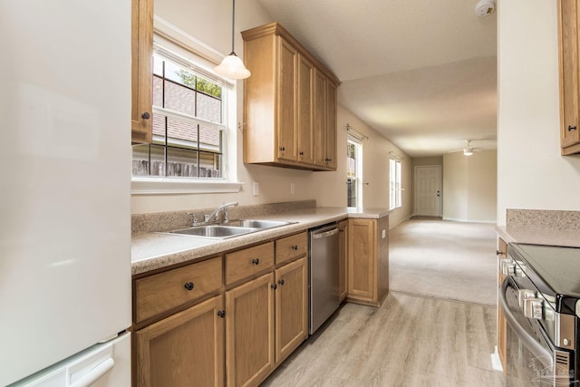 6027 Dallas Ave, Pensacola, FL 32526 - kitchen with freestanding refrigerator, dishwasher, light wood finished floors, stove, and pendant lighting