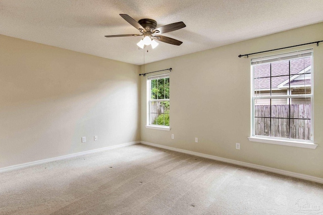 6027 Dallas Ave, Pensacola, FL 32526 - unfurnished room featuring ceiling fan, carpet, and a textured ceiling