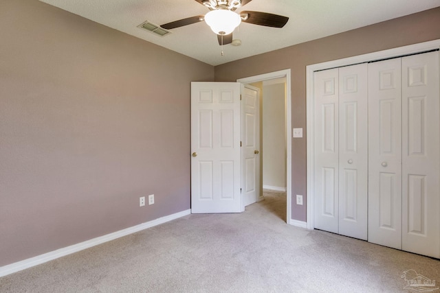 6027 Dallas Ave, Pensacola, FL 32526 - unfurnished bedroom with carpet floors, a closet, and ceiling fan