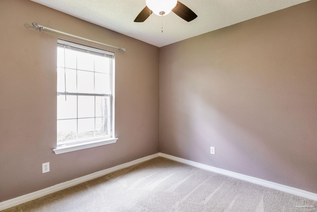 6027 Dallas Ave, Pensacola, FL 32526 - carpeted empty room with a ceiling fan and healthy amount of natural light