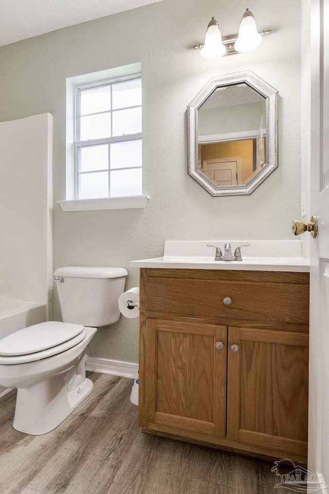 6027 Dallas Ave, Pensacola, FL 32526 - full bathroom featuring vanity, wood finished floors, and tub / shower combination