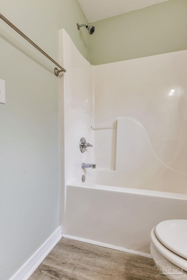 6027 Dallas Ave, Pensacola, FL 32526 - bathroom featuring wood finished floors and  shower combination