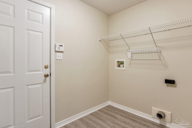 6027 Dallas Ave, Pensacola, FL 32526 - laundry area featuring light wood-type flooring, electric dryer hookup, and hookup for a washing machine
