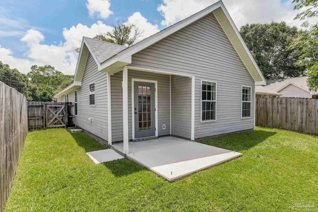 6027 Dallas Ave, Pensacola, FL 32526 - back of property featuring a patio area, a fenced backyard, and a gate
