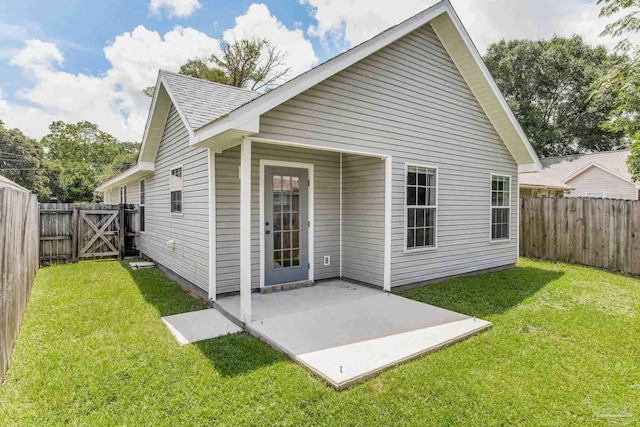 6027 Dallas Ave, Pensacola, FL 32526 - rear view of house with a patio, a fenced backyard, and a gate