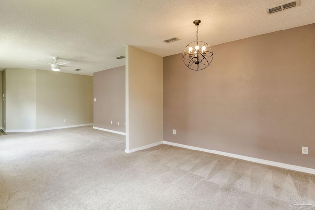6027 Dallas Ave, Pensacola, FL 32526 - spare room featuring a chandelier, light colored carpet, a ceiling fan, and a textured ceiling