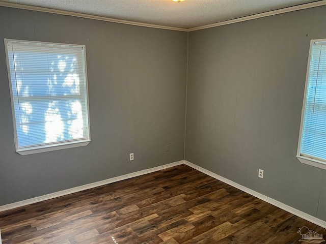 6255 Memphis Ave, Pensacola, FL 32526 - unfurnished room with dark wood-type flooring, healthy amount of natural light, a textured ceiling, baseboards, and crown molding