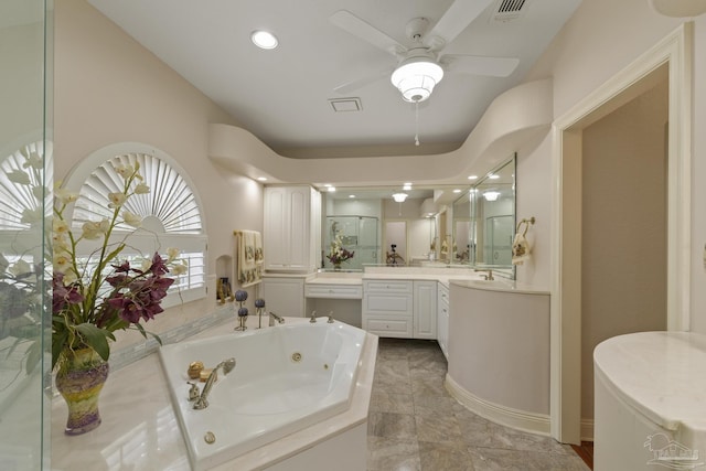 bathroom featuring visible vents, a ceiling fan, a jetted tub, vanity, and recessed lighting