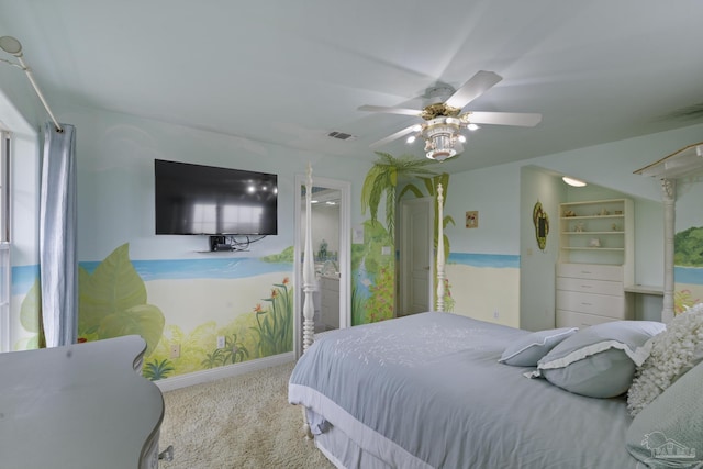 carpeted bedroom with visible vents, multiple windows, a ceiling fan, and baseboards