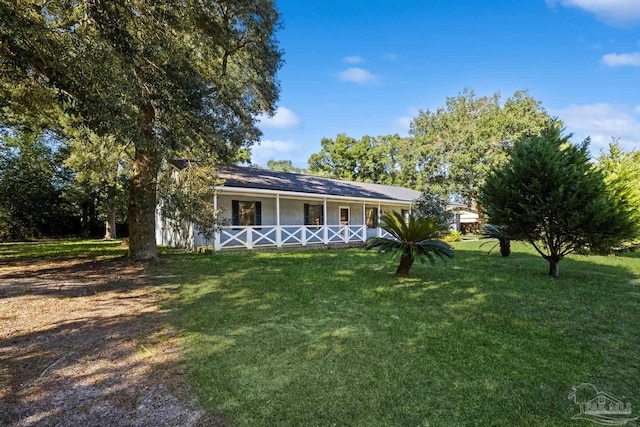 view of front facade with a porch and a front yard