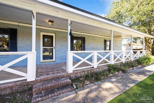 entrance to property with a porch