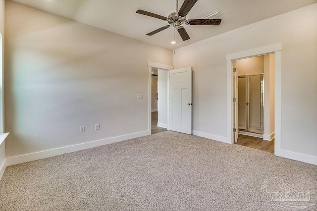 unfurnished bedroom with carpet floors and ceiling fan