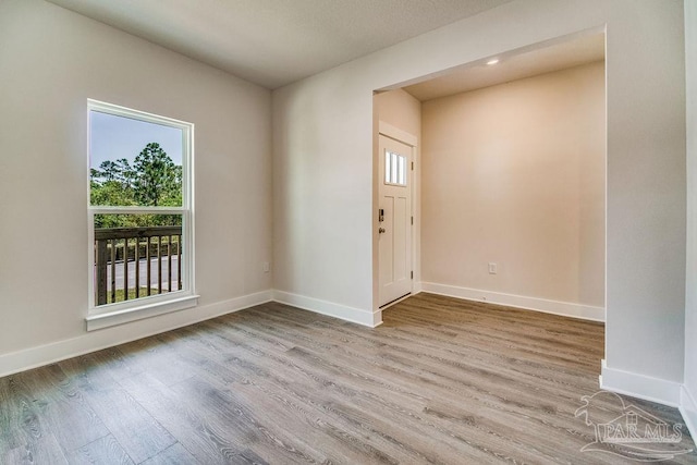 foyer entrance featuring hardwood / wood-style flooring