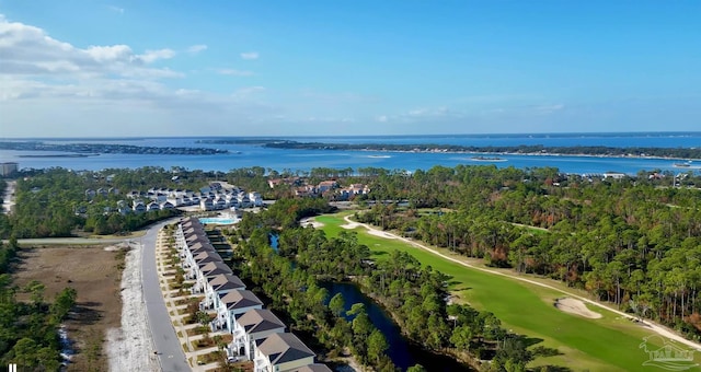 birds eye view of property featuring view of golf course and a water view