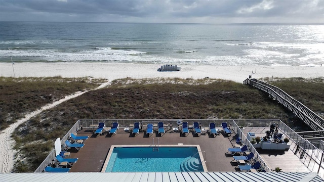 aerial view with a beach view and a water view