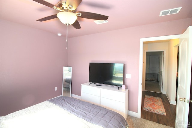 bedroom featuring ceiling fan and carpet floors