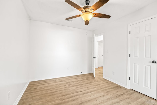 unfurnished bedroom with light hardwood / wood-style floors and ceiling fan