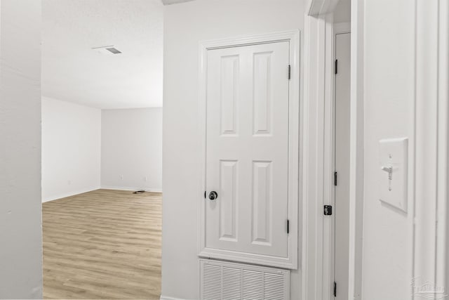 hallway featuring light hardwood / wood-style floors