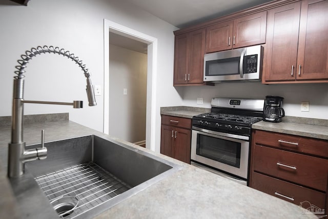 kitchen with sink and stainless steel appliances