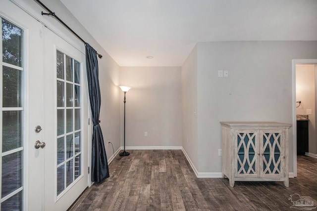 hallway with dark wood-type flooring