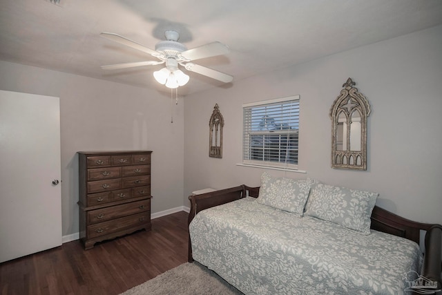 bedroom with ceiling fan and dark wood-type flooring