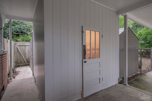 property entrance with a patio