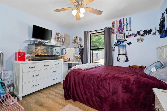 6819 Old W Ln, Milton, FL 32570 - bedroom with access to outside, light wood-style flooring, and ceiling fan