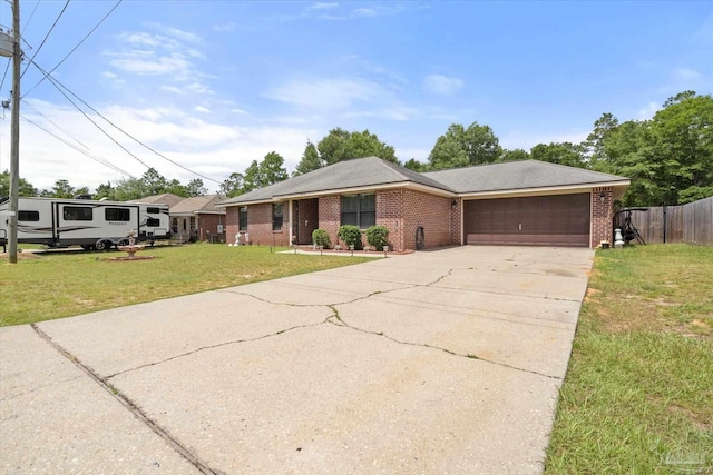 6819 Old W Ln, Milton, FL 32570 - single story home featuring brick siding, an attached garage, and driveway