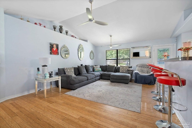 6819 Old W Ln, Milton, FL 32570 - living room with a ceiling fan, light wood-type flooring, lofted ceiling, and baseboards