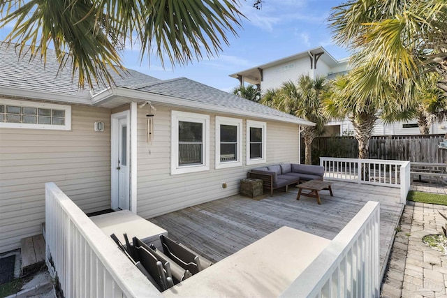 wooden deck featuring an outdoor living space