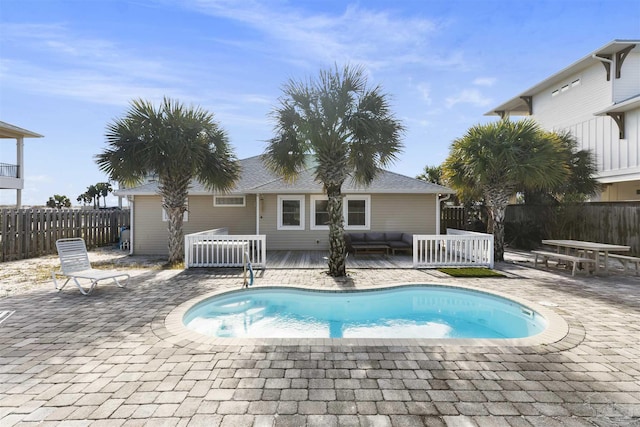 view of pool featuring a patio area