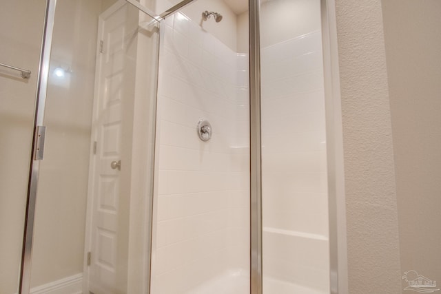 bathroom with an enclosed shower