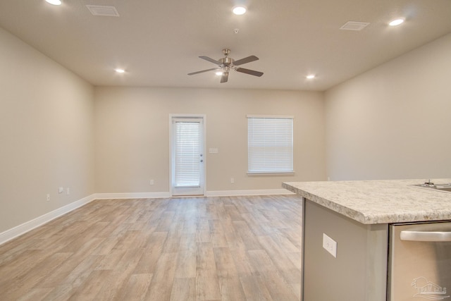 kitchen with light hardwood / wood-style flooring and ceiling fan