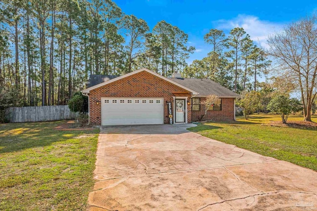 ranch-style home featuring a garage, brick siding, a front yard, and fence