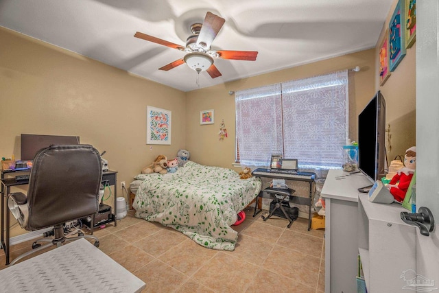 bedroom featuring light tile patterned floors and a ceiling fan