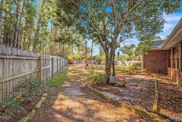 view of yard featuring a fenced backyard