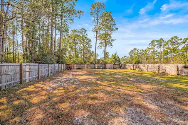 view of yard featuring a fenced backyard