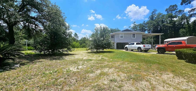 view of yard with a carport