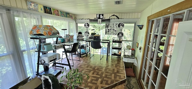 sunroom / solarium with visible vents