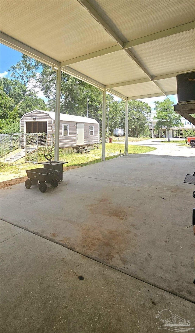 view of patio featuring fence