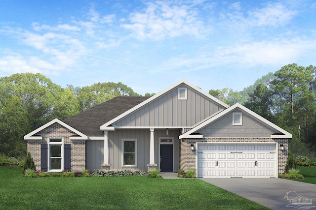 view of front of property with a front yard and a garage