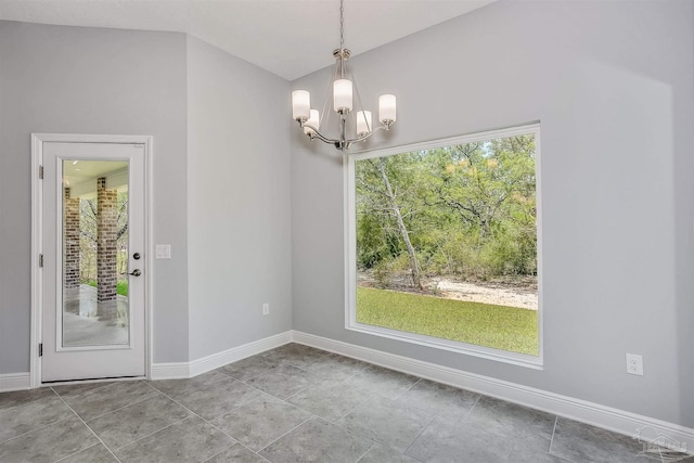 unfurnished dining area with vaulted ceiling, a notable chandelier, and light tile patterned flooring