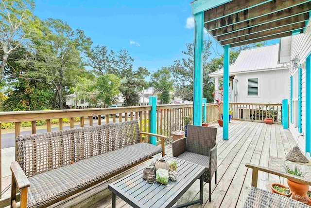 wooden deck with an outdoor hangout area