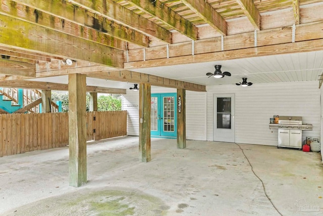 view of patio with french doors and ceiling fan