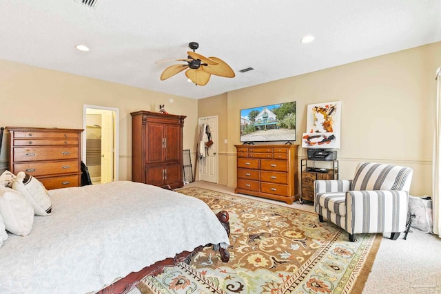 carpeted bedroom with ceiling fan