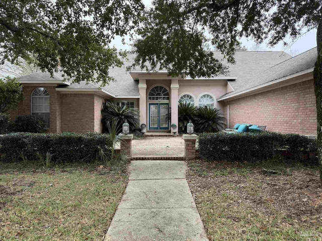 view of front of property with brick siding