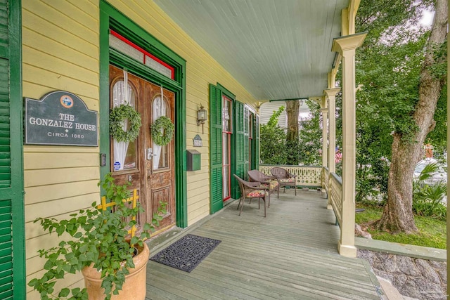 deck featuring covered porch