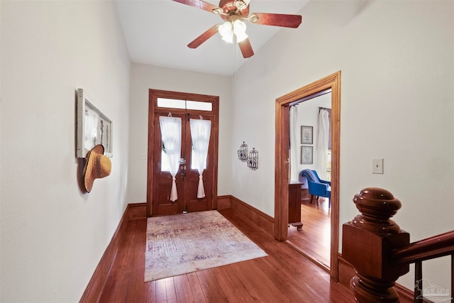 foyer with wood-type flooring, french doors, and ceiling fan